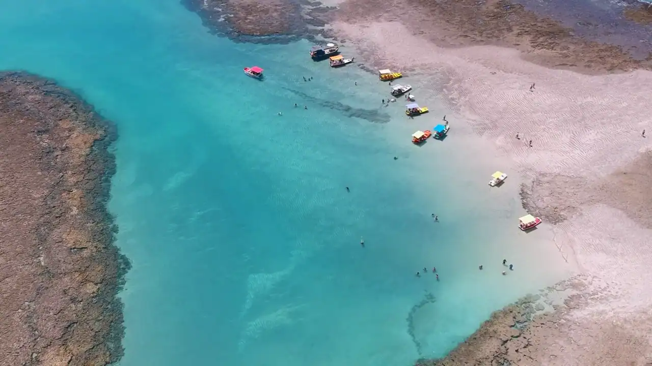 Turquoise lagoon with anchored boats